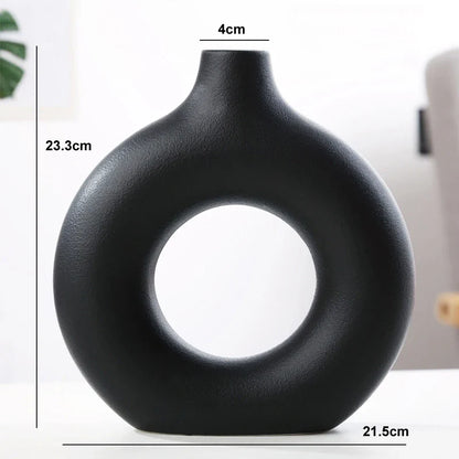 Orvella – Keramische donut vaas met open cirkel design